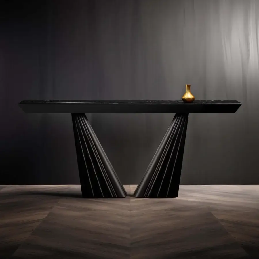 Console table, dark wood, inverted V-legs with layered design, rectangular tabletop with textured surface, gold vase, chevron wood floor.
