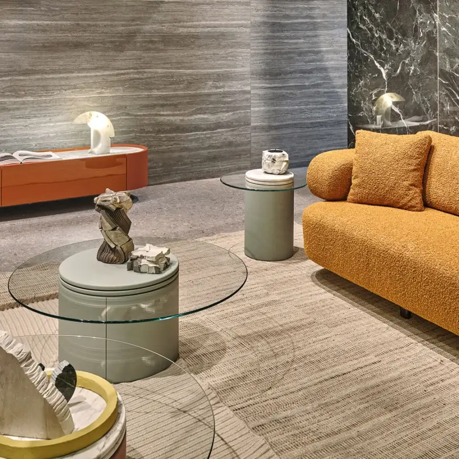 Architectural Turri Roma side table with muted green-grey leather base and cantilevered crystal top