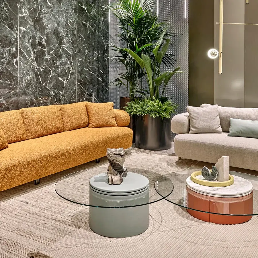 Distinguished Turri Roma side table with rounded lines, cylindrical leather base and cantilevered crystal top with marble accent