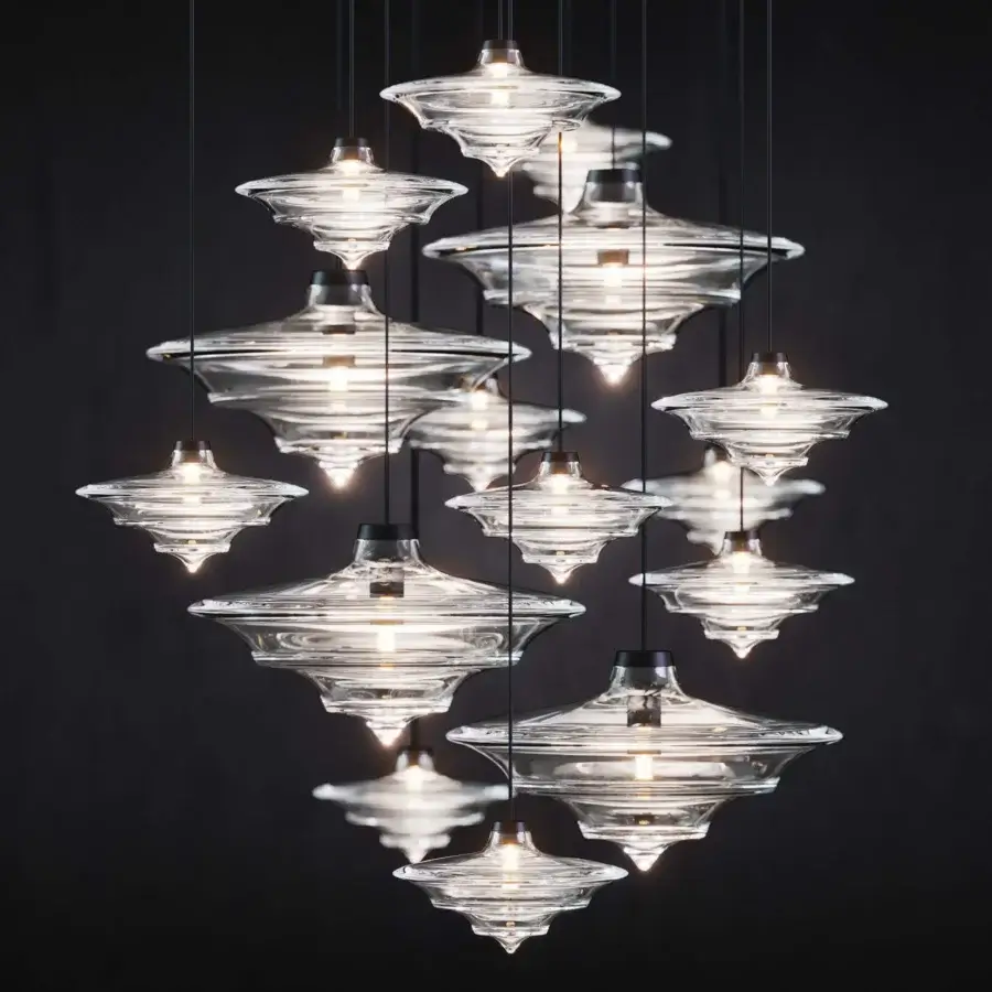 Exclusive WAYNE Enterprises WE-002 suspension lamp with sleek dark metal and illuminated extra clear crystal shades suspended by thin black cables