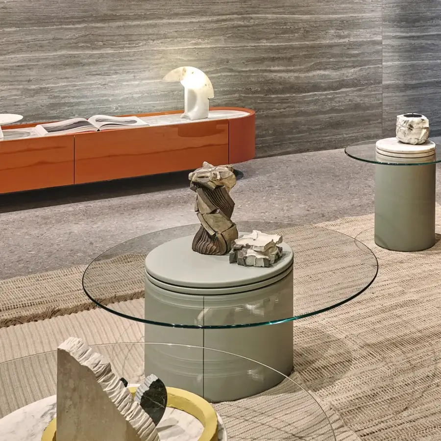 Distinguished Turri Roma coffee table with light greenish-gray leather cylindrical base and cantilevered transparent crystal top
