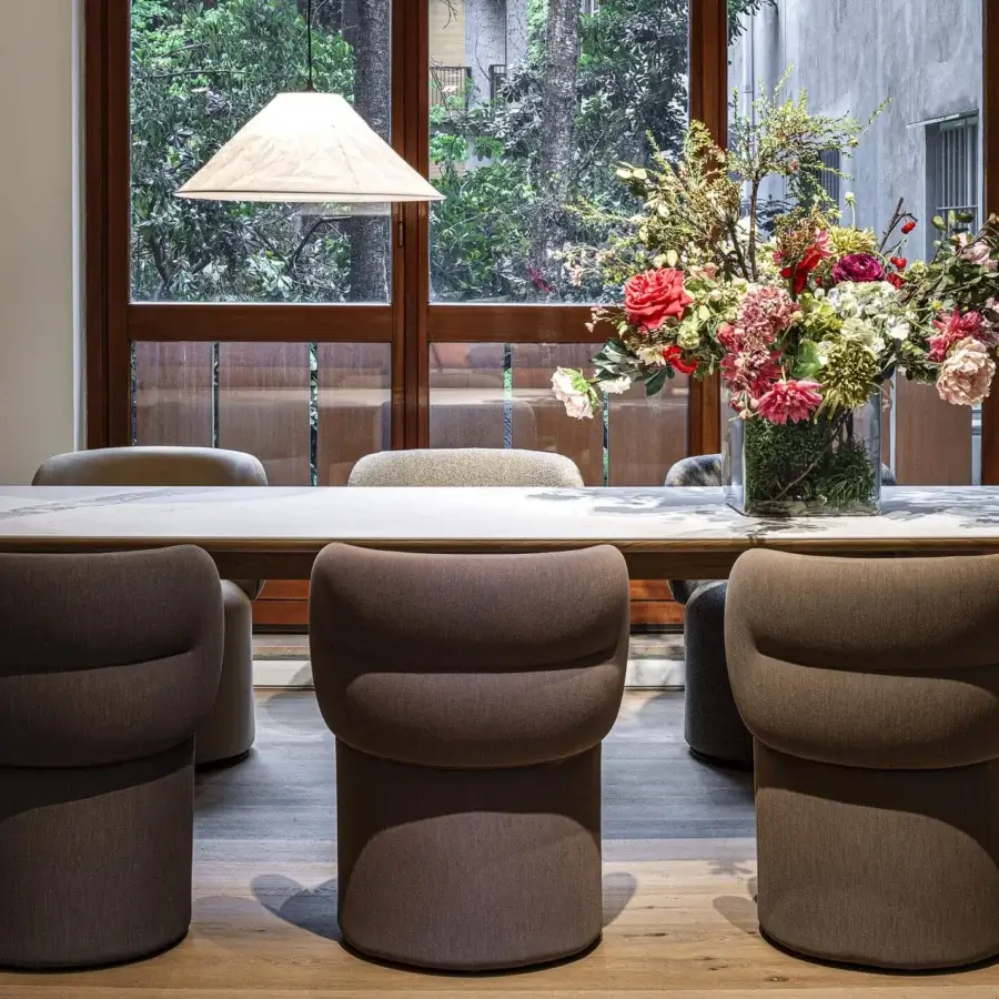 Exceptional Moroso Getlucky chair with ribbon-like backrest and comfortable textile seat in medium brown with matte finish