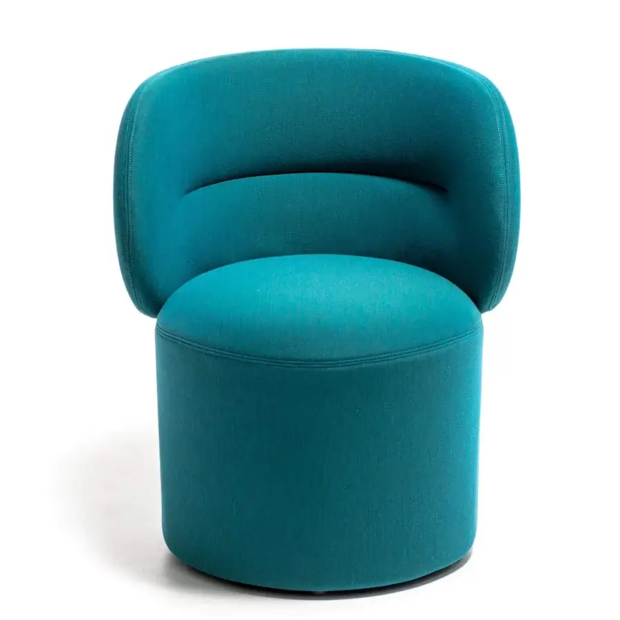 Elegant Moroso Getlucky chair upholstered in uniform teal woven textile with transparent PVC glides