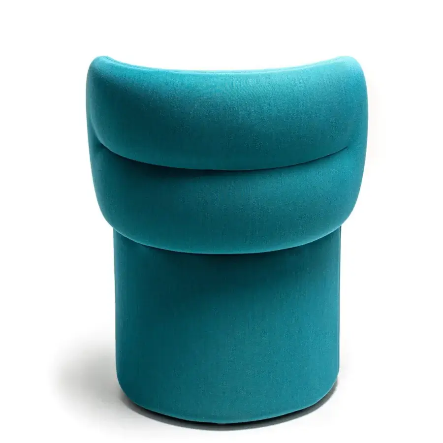 Sophisticated Moroso Getlucky chair crafted in blue textile with cylindrical base and ribbon-like backrest design