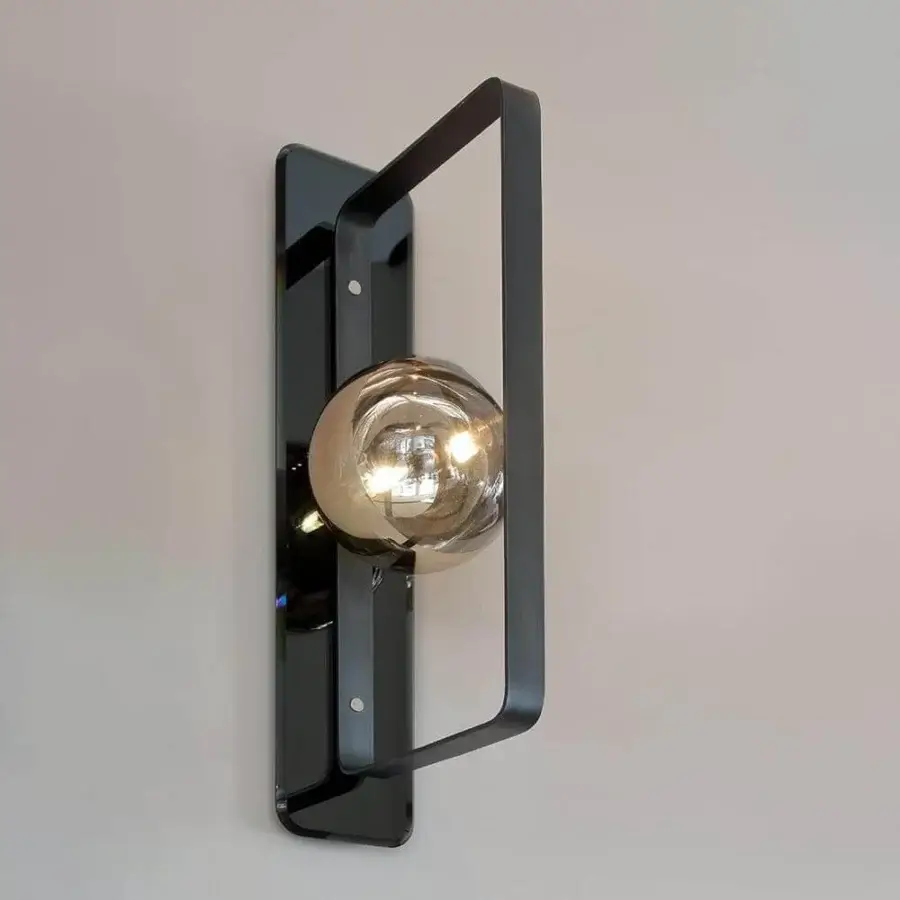 Exceptional Reflex Oh wall lamp with a contemporary metal structure and smoke mirror base in translucent metallic gold borosilicate glass