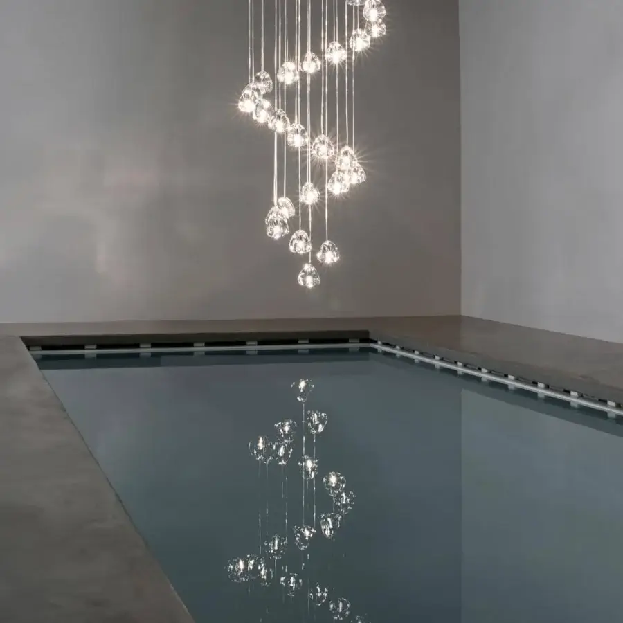 Exclusive Terzani Mizu Multi Light suspension lamp with descending spiral crafted crystal elements and glossy finish
