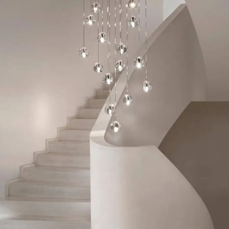 Distinguished Terzani Mizu Multi Light suspension lamp with uniquely shaped crystal diffusers and glossy metal cables