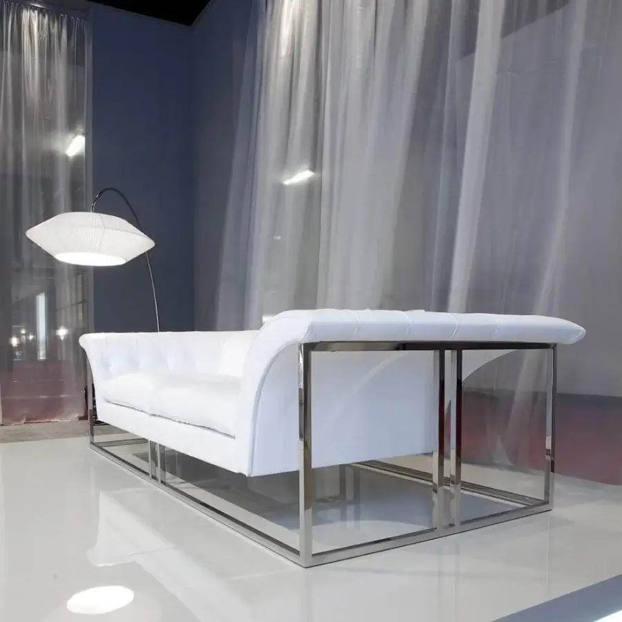 Superior Erba Rockouture sofa crafted in Italy with smooth white synthetic textile upholstery and bright stainless steel base