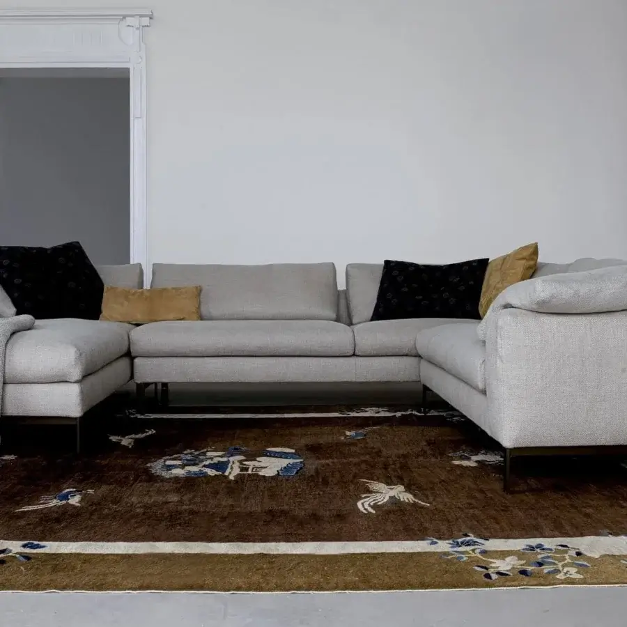 Lavish Swan Italia Molvedo sectional with feather-down cushions and removable light gray fabric upholstery built on a dark powder-coated base