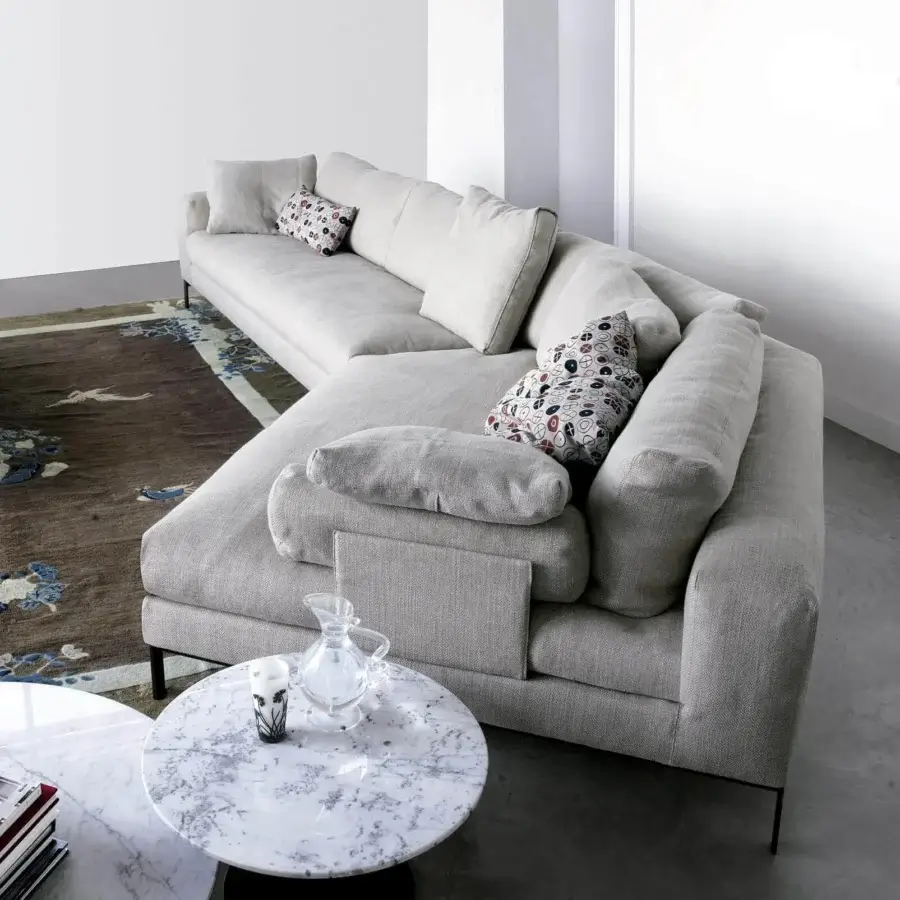 Distinguished Swan Italia Molvedo sectional with light gray textured fabric, feather-down cushions and dark brown-bronze powder-coated metal legs