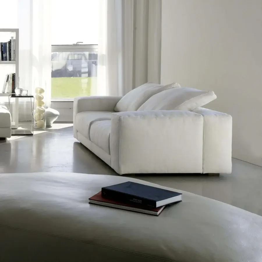 Superior Swan Italia Hills sofa with light-toned fabric upholstery and powder-coated metal feet