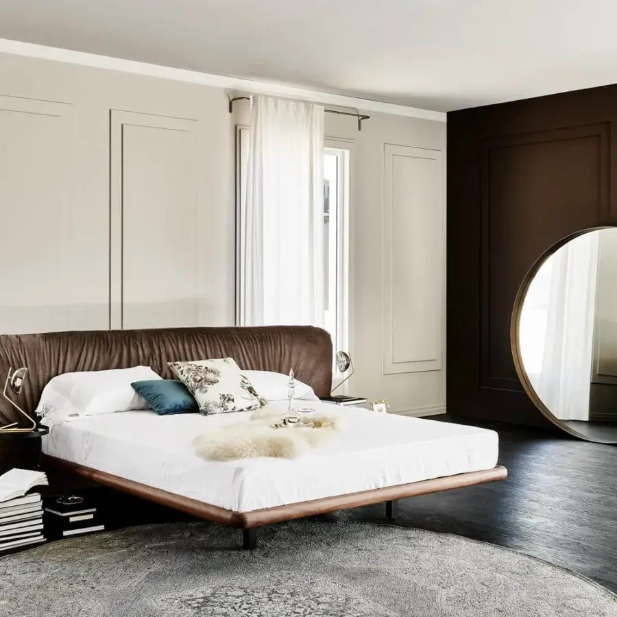 Distinguished Cattelan Italia Marlon bed with a Canaletto walnut frame and deep brown tufted textile headboard