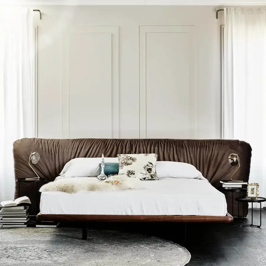 Refined Cattelan Italia Marlon bed with a Canaletto walnut frame and dark brown upholstered headboard built with horizontal pleating