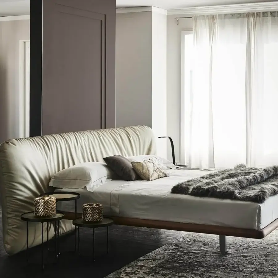 Superior Cattelan Italia Marlon bed with a Canaletto walnut frame and draped light cream upholstered headboard