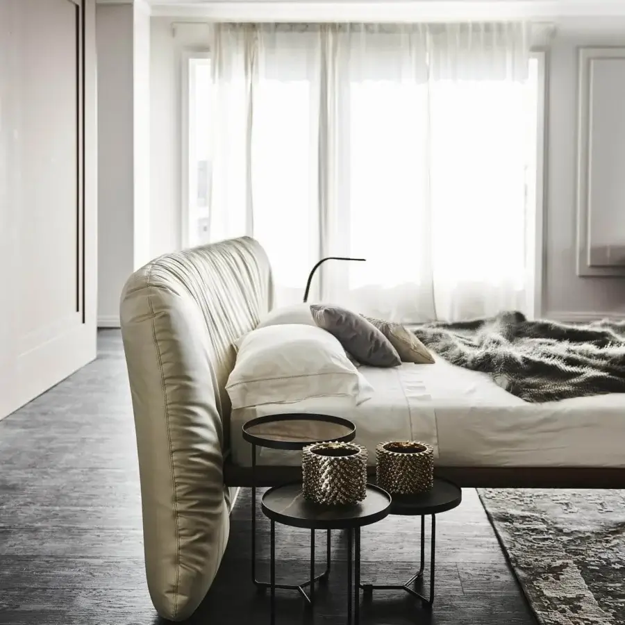 Distinguished Cattelan Italia Marlon bed with a Canaletto walnut frame and luxuriously upholstered headboard in subtly sheened fabric