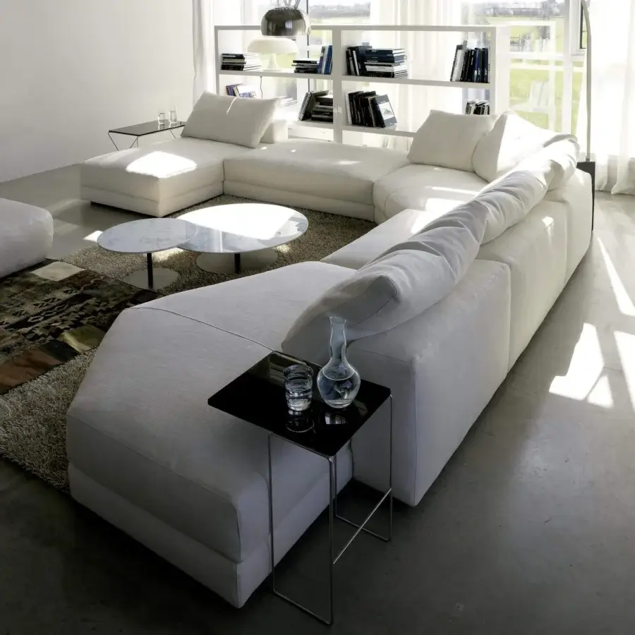 Exceptional Swan Italia Hills sectional with white removable fabric and generous feather filled cushions