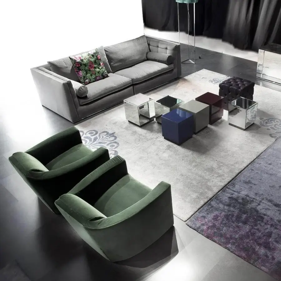 Distinguished Erba Get Back sofa with a solid wood frame and bright chrome steel feet, upholstered in smooth matte gray textile with a tufted backrest