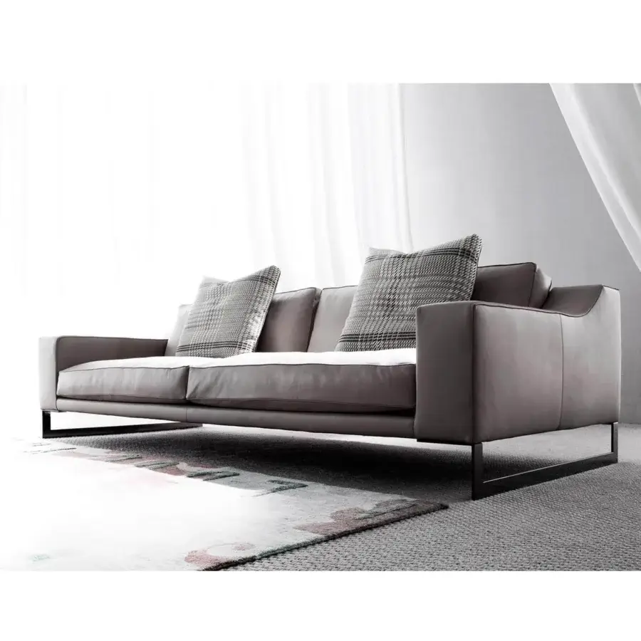Distinguished Erba Indizio sofa with gray textile upholstery, steel frame, and bright chrome finished feet