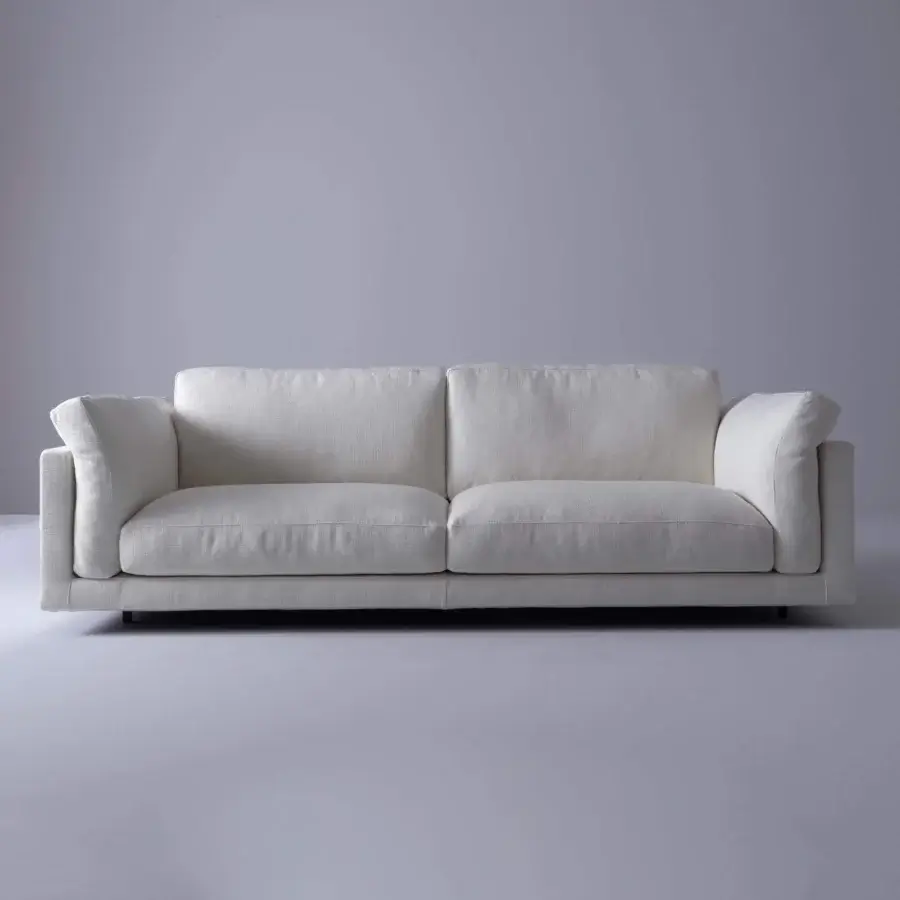 Distinguished Swan Italia host sofa with light textured fabric upholstery and powder-coated metal feet