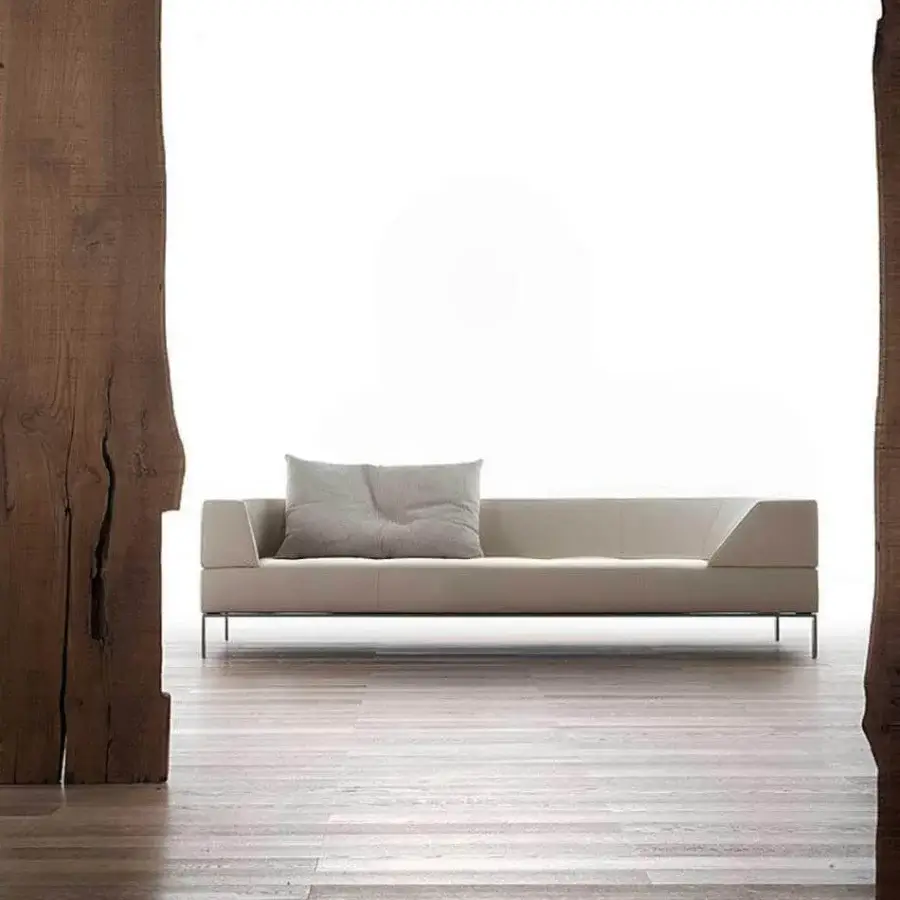 Superior Erba Culture Club sofa with light beige smooth material and dark powdered steel feet construction