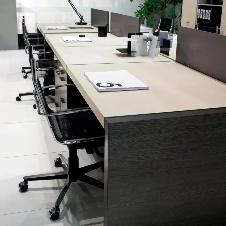 Exceptional 4 Mariani Blade desk built with light beige wood and dark brown saddle leather accents