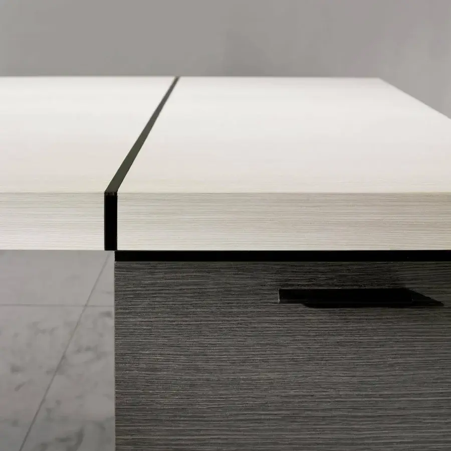 Superior 4 Mariani Blade desk with light-toned wood, a dark band, and dark gray drawers built in saddle leather detailing