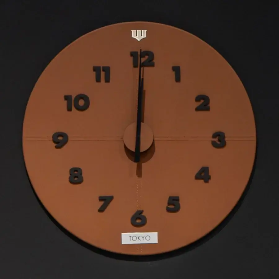 Exclusive WAYNE Enterprises WE-250 Wall Clock crafted in medium brown leather with black numerals and iconic Wayne logo