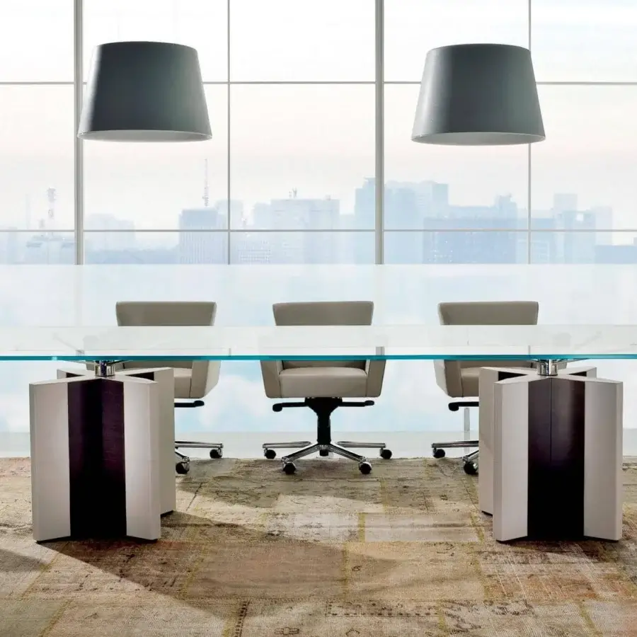 Distinguished 4 Mariani De-Symetria conference table with clear glass and light-colored columnar bases in polished chromed steel