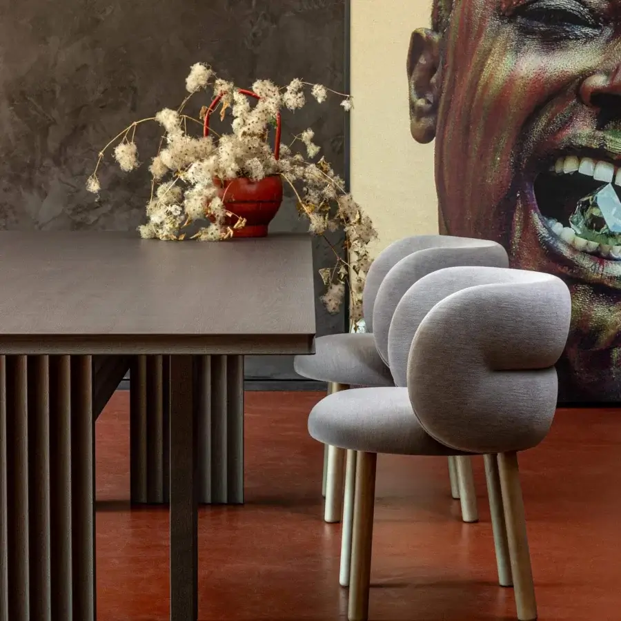 Superior Moroso Getlucky chair crafted with matte gray textile upholstery and varnished ash wood frame
