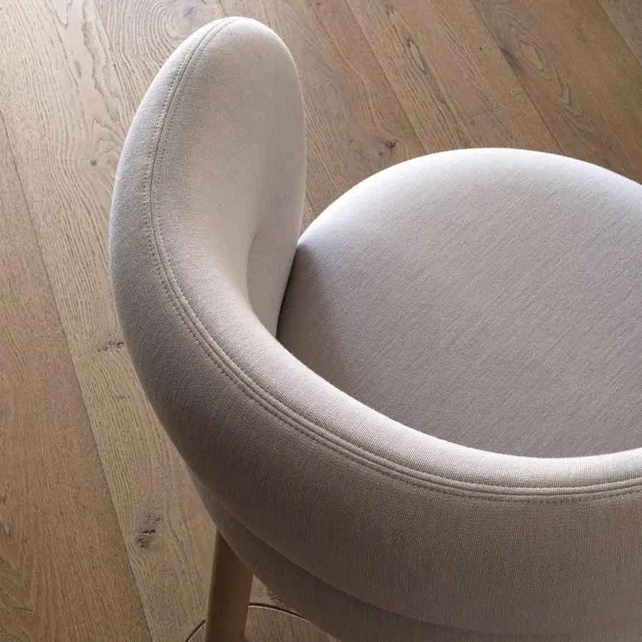 Superior Moroso Getlucky chair crafted in Italy with light beige textile upholstery and varnished ash wood structure