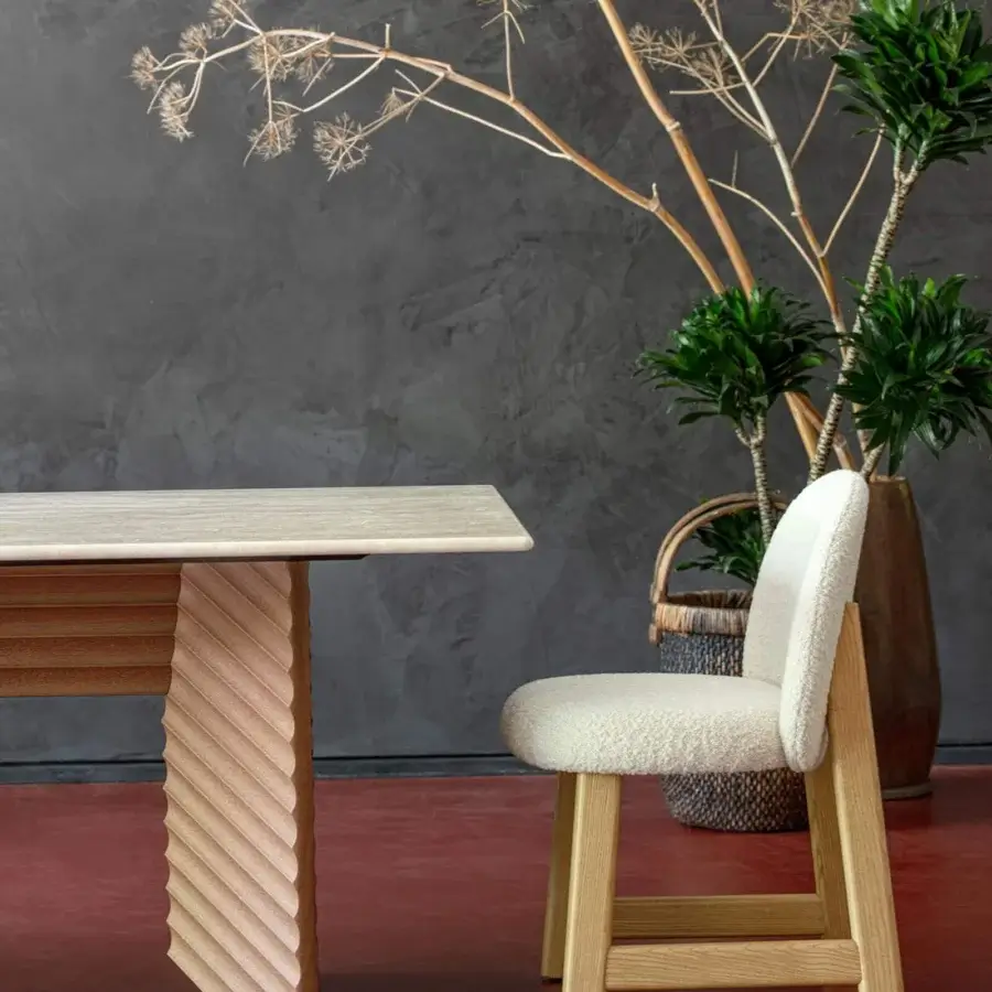 Sophisticated Moroso Pheaby chair built in painted ash with softly-rounded off-white textured fabric upholstery