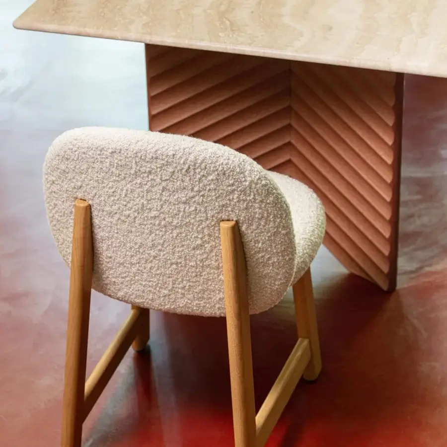 Lavish Moroso Pheaby chair built in painted ash with textured off-white fabric and rounded seat back