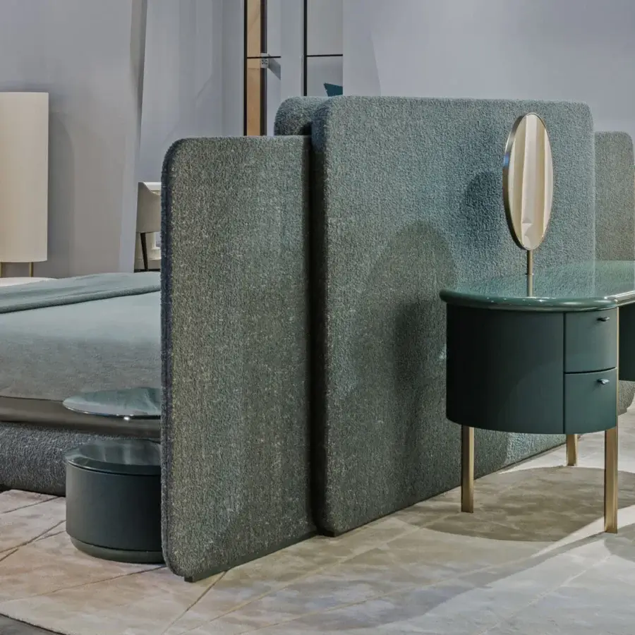 Distinguished Turri Roma vanity in teal-green with leather drawers and champagne gold metal legs supporting an oval mirror