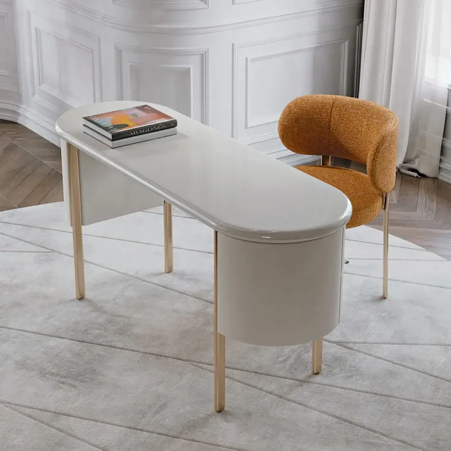 Elegant Turri Roma desk with curved top in light beige material and champagne gold metal legs crafted with four leather drawers