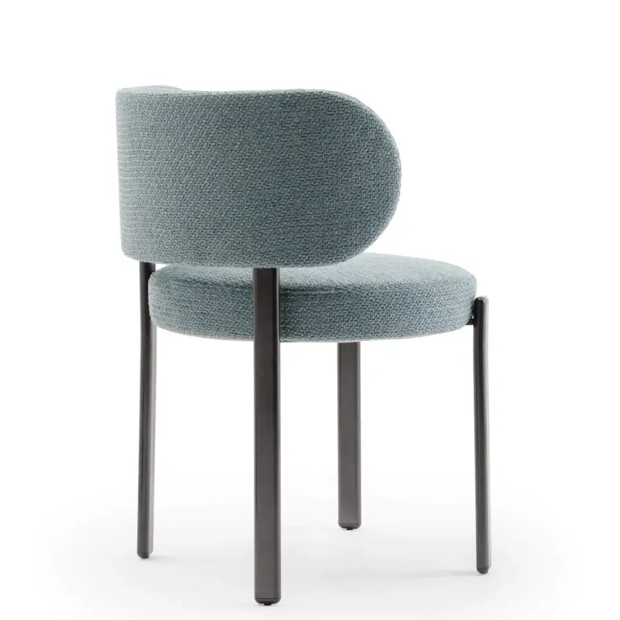 Exclusive Turri Roma chair with rounded silhouette upholstered in textured blue-gray fabric and dark matte metal legs