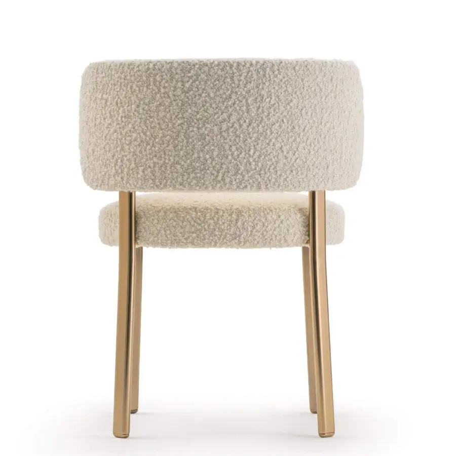 Superior Turri Roma chair with rounded silhouette upholstered in textured cream fabric and gold-finished metal legs