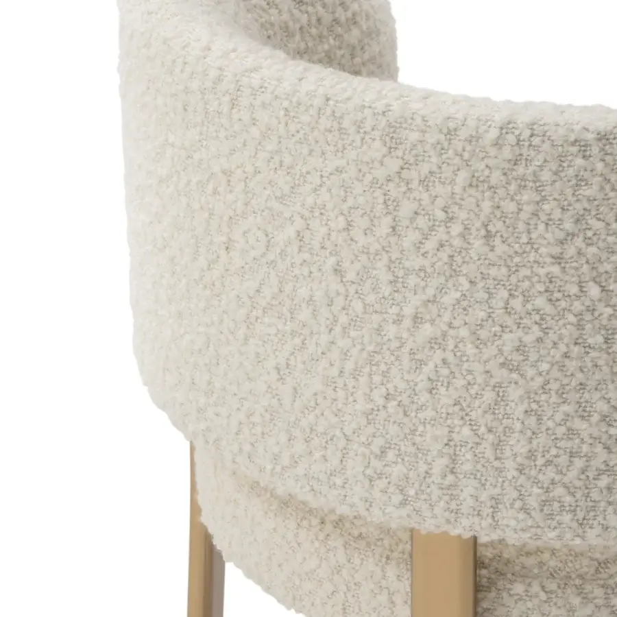 Lavish Turri Roma chair with rounded silhouette upholstered in plush cream textile and reflective metal legs
