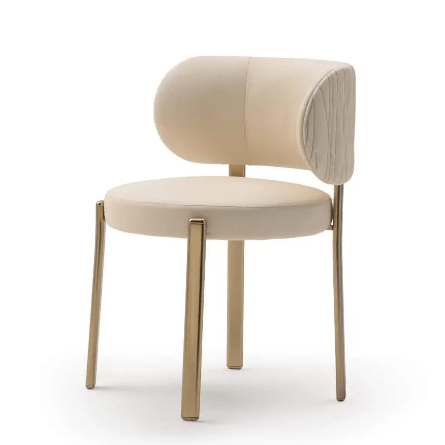 Distinguished Turri Roma chair with curved silhouette and light cream fabric upholstery complemented by glossy metal legs