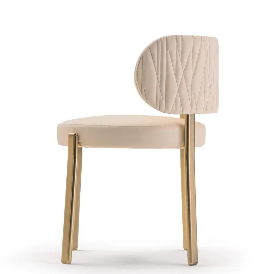 Exclusive Turri Roma chair with rounded form and light beige textile upholstery crafted with glossy golden metal legs