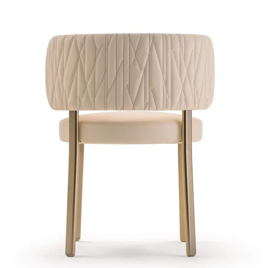 Captivating Turri Roma chair with quilted backrest and smooth light cream textile upholstery with glossy golden metal legs