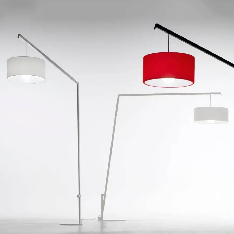 Elegant Modo Luce Angelica floor lamp with slender angular form in embossed white painted metal and light gray cotton lampshade