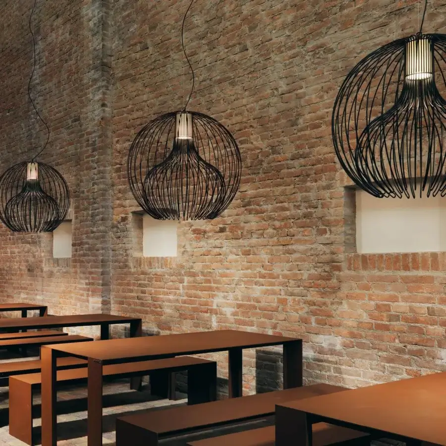 Distinguished Modo Luce Icaro Ball outdoor suspension lamp with spherical matte black painted steel wire construction and protective coating