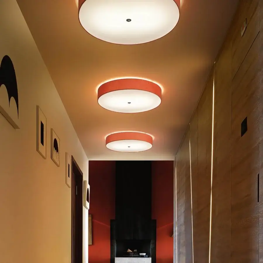 Elegant Modo Luce Discovolante ceiling lamp with white diffuser and burnt orange fabric belt wrap