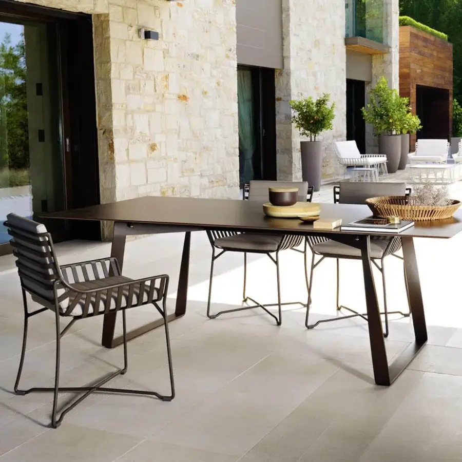 Distinguished Roberti Rattan Hamptons Graphics table with a square HPL top and dark brown matte powder-coated metal base