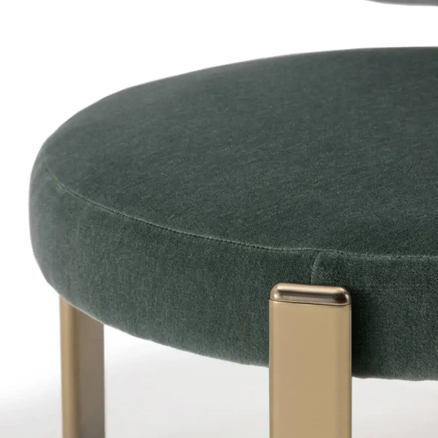 Exclusive Turri Roma lounge chair with muted green fabric upholstery and gold tone metal legs crafted with a matte finish
