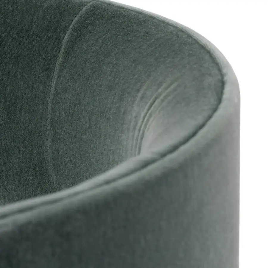 Elegant Turri Roma lounge chair with muted green textile upholstery and refined metal legs