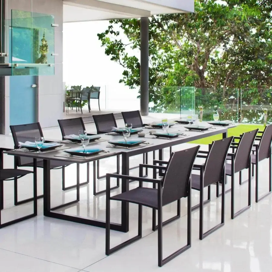 Exclusive Royal Botania Ninix extendable table with a dark gray matte finish and robust metal frame