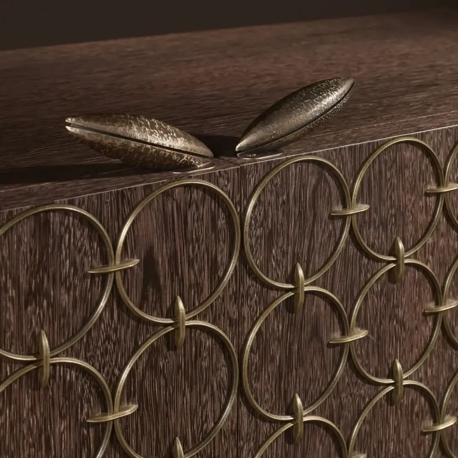 Distinguished Bellavista Luis sideboard built with Italian poplar, European wood veneer, bronzed metal relief, and saddle-leather drawers