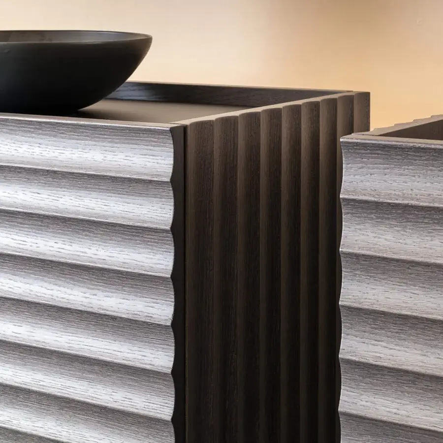 Elegant Moroso Rows cupboard with oak veneer and fluted side panels, exhibiting contrasting horizontal ridged fronts