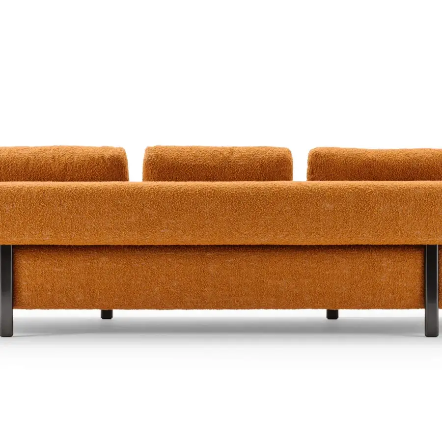 Distinguished Turri Roma sofa with comfortable cushions, textured orange fabric and graphite gray metal legs